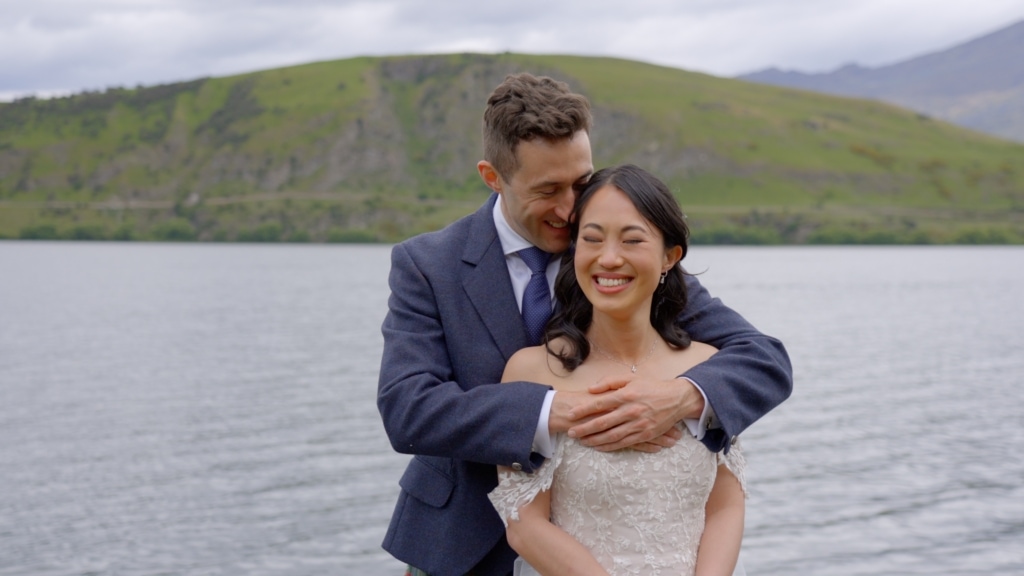 Bride and groom on the shores of Lake Wanaka
