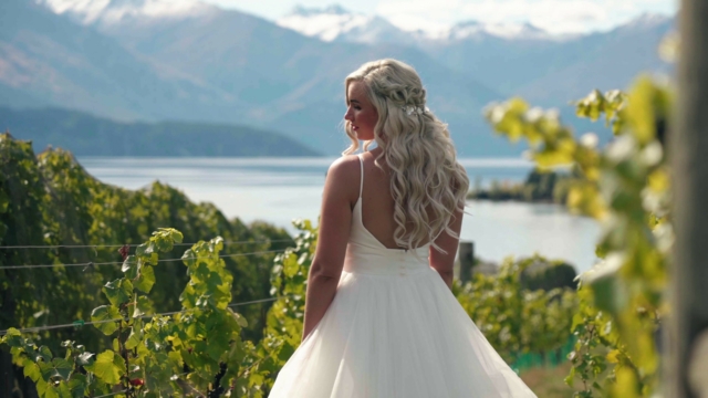 Bride wearing dress in vineyard in Wanaka, New Zealand